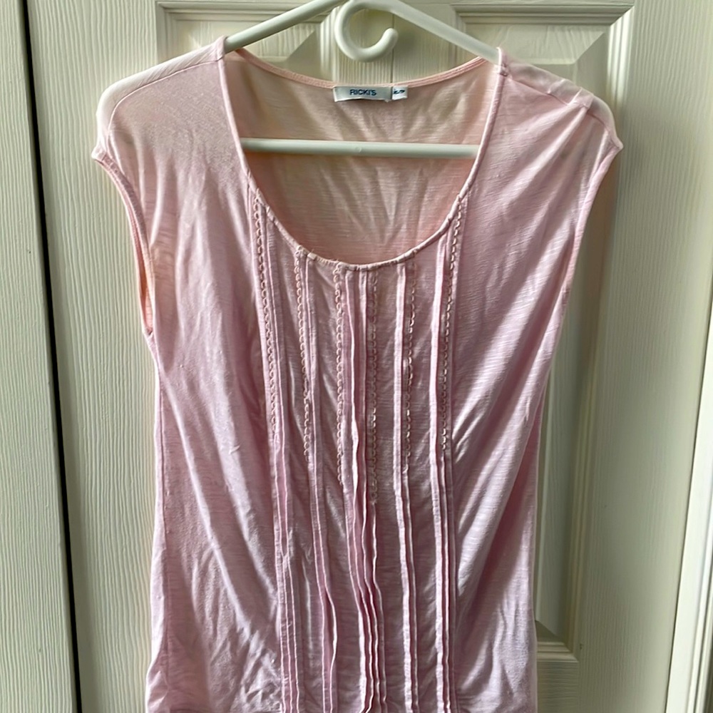 Ricki’s pale pink XS cap sleeve blouse